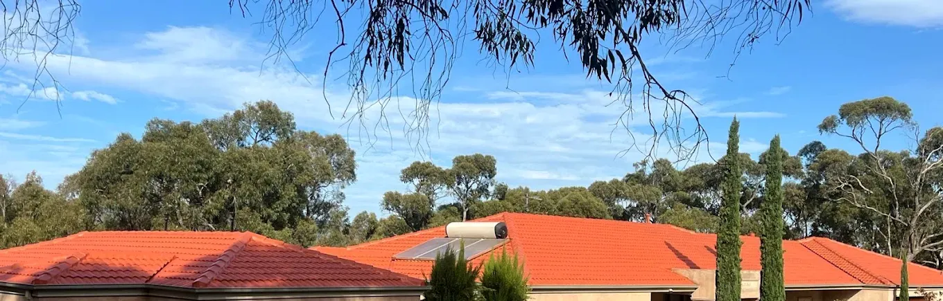 Wide view of completed terracotta roof restoration